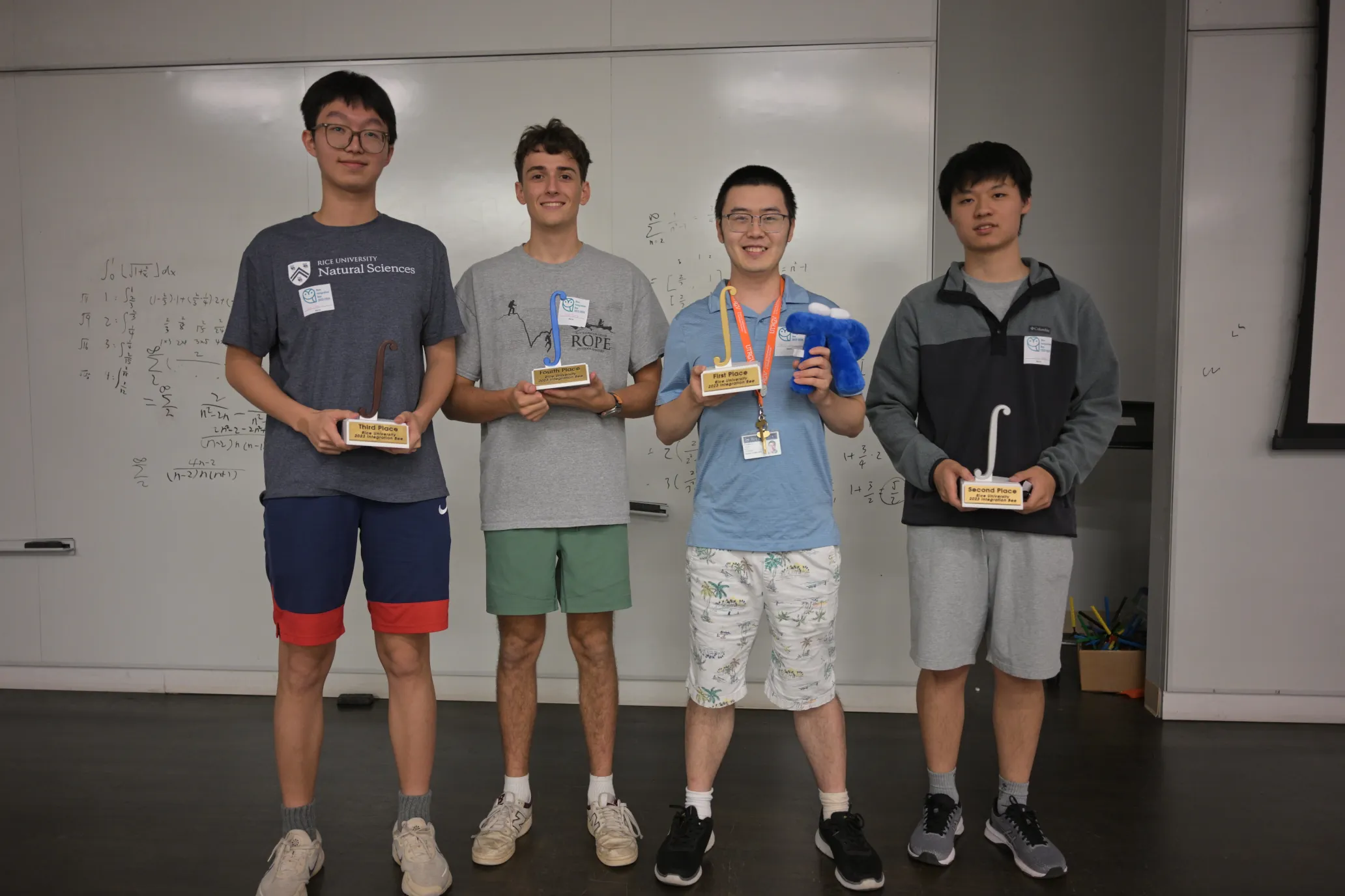 The 4 finalists posing with their trophies